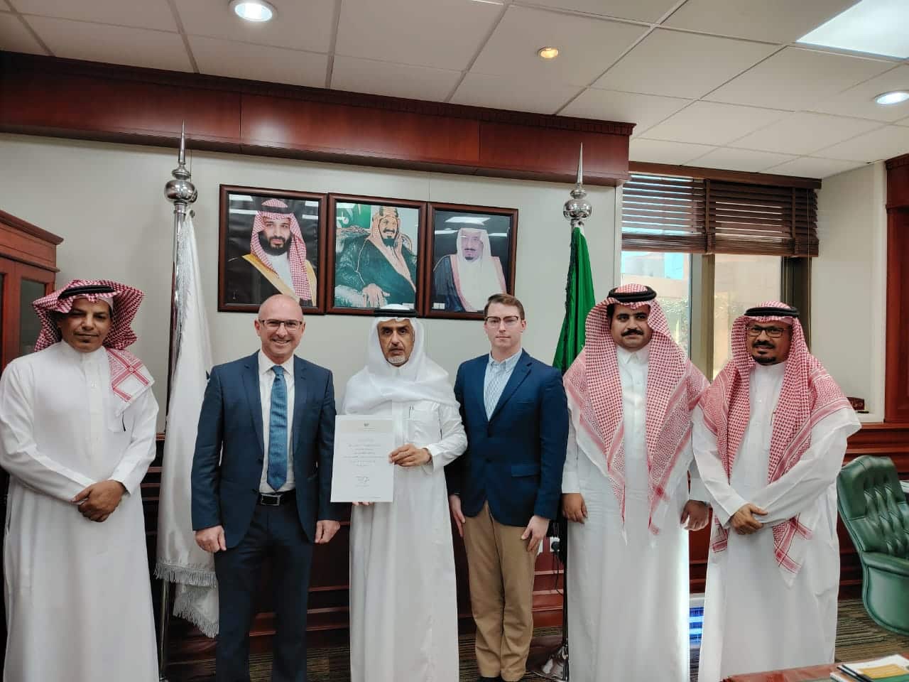 The Remotair Team receives a certificate of appreciation in Saudi Arabia.